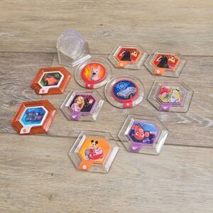 Disney Infinity power disc's lot of 11 Mulan, mickey, rapunzel, Alice, Nemo, car